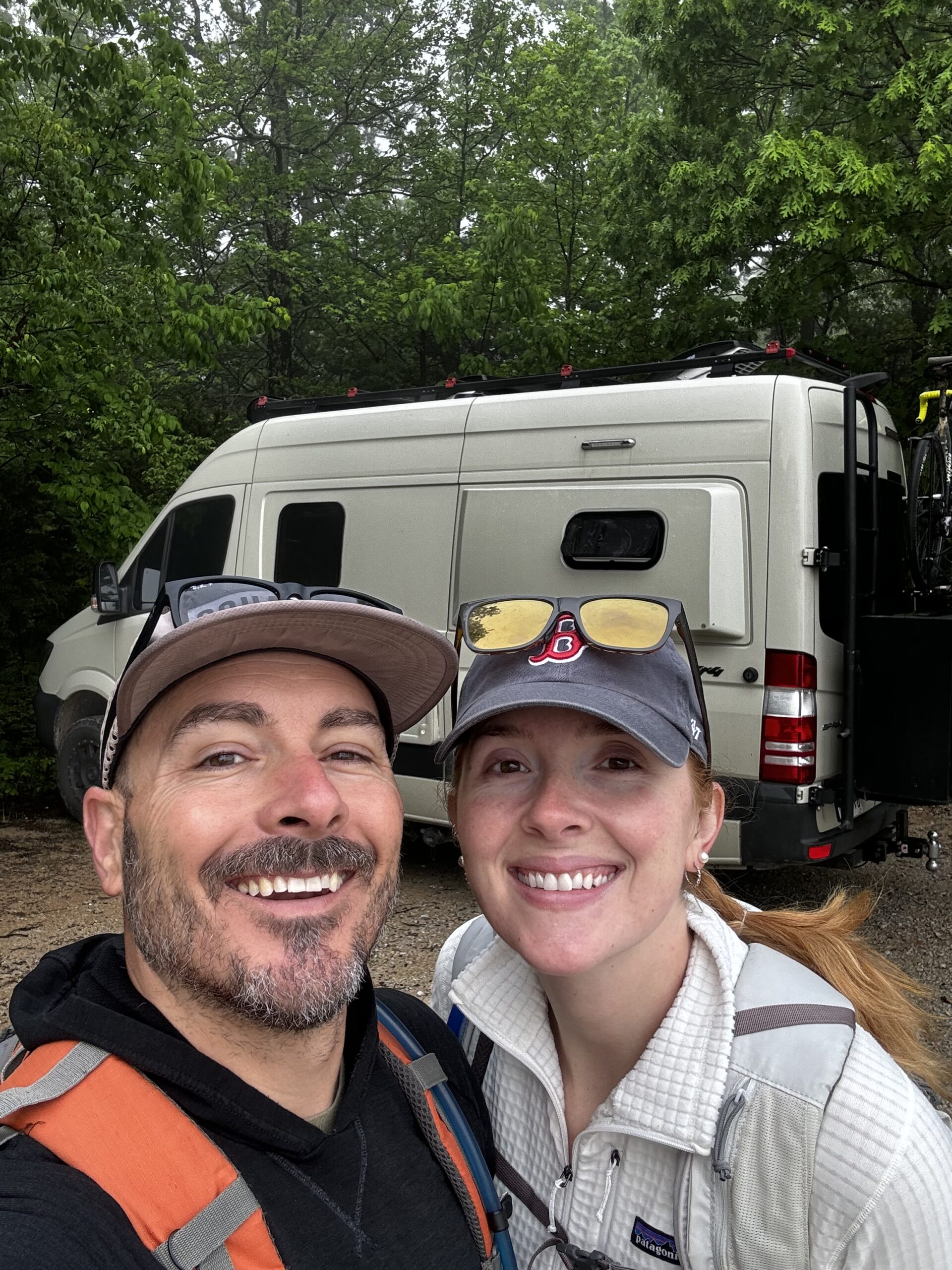 Christian and Sydney Dodge enjoying time outdoors beside their adventure van